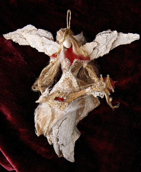 angel wood ornament with bird guitar
